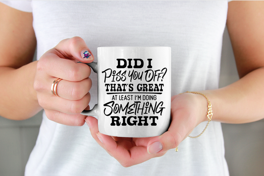 Person holding a white mug with humorous text design.