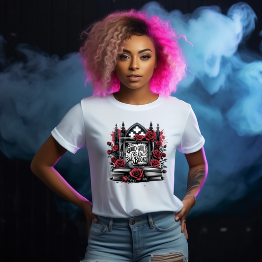 Person wearing a white t-shirt with a graphic design saying Good Girls Read Bad Books, Ideal for Booktok or book lovers, against a dark background with smoke effects