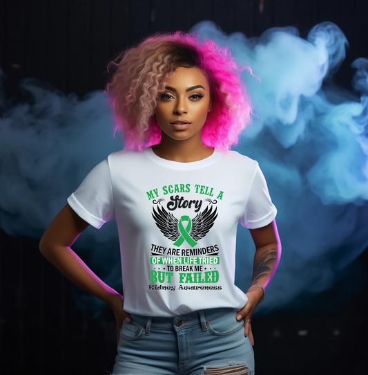 Person wearing a white t-shirt with a green ribbon design and text, standing against a dark background with smoke effects and text with kidney awareness description