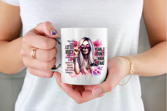 Person holding a mug with a sarcastic colourful design and text little voice in my head yea I don't have that funny cup ideal for gothic halloween christmas or birthday gift
