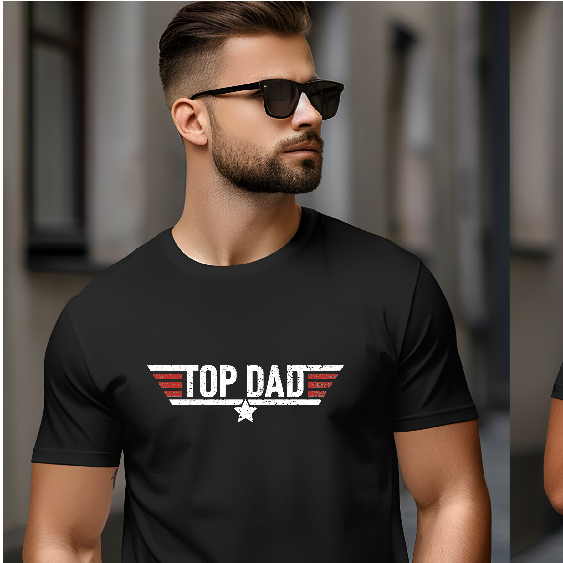Man wearing a black t-shirt with 'TOP DAD' text and sunglasses.